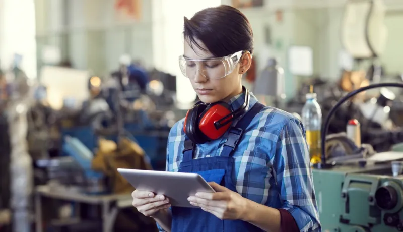 A contractor using a tablet. 