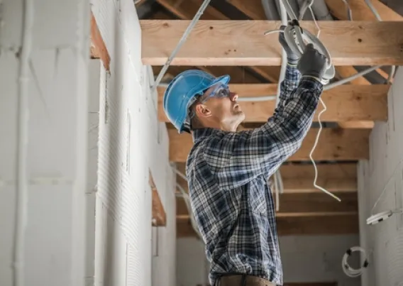 person working on lighting