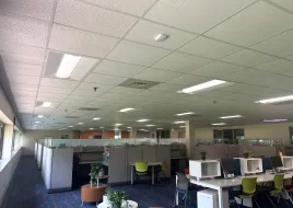 A shot of a well lit office space recently remodeled. 